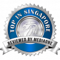 An award badge provided by the review site MediaOne, which states Top in Singapore